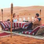 Couple in open desert with private proposal setup in Dubai